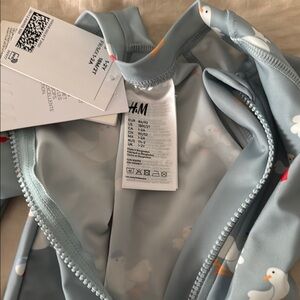 H&M Light Blue Jacket with Duck Pattern